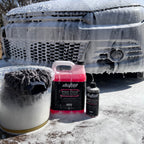 High Foam Wash and Wax 500ml and 5 litre, front of car, with bucket filled with thick foam and wash mitt