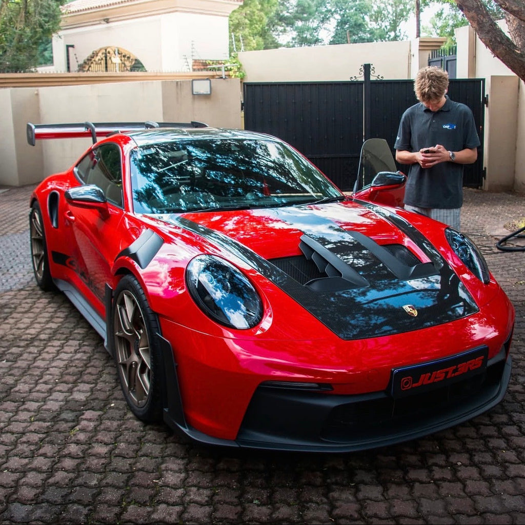 on foot detail cleaned porsche gt3rs high foam auto wash