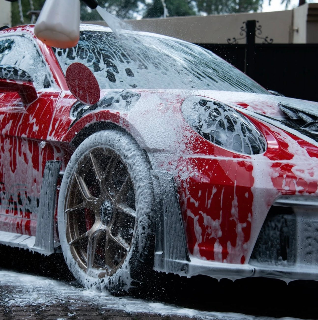 porsche gt3rs detail by dmp high foam shampoo covering car